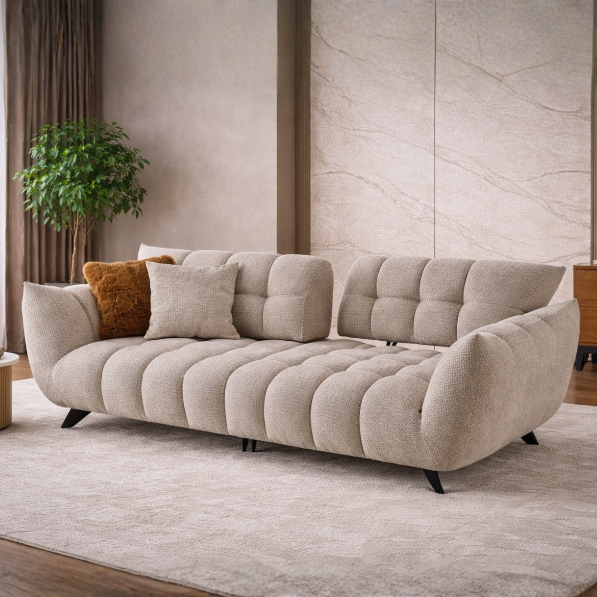 Beige sofa with cushions in a room with a plant and wooden furniture.