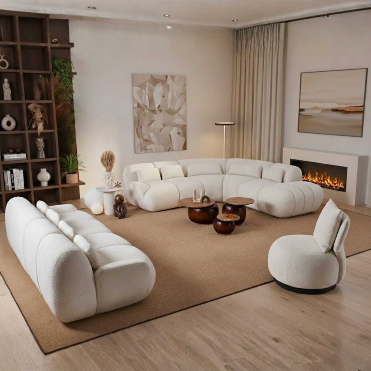 Modern living room with a large white sectional sofa, coffee tables, and a fireplace.