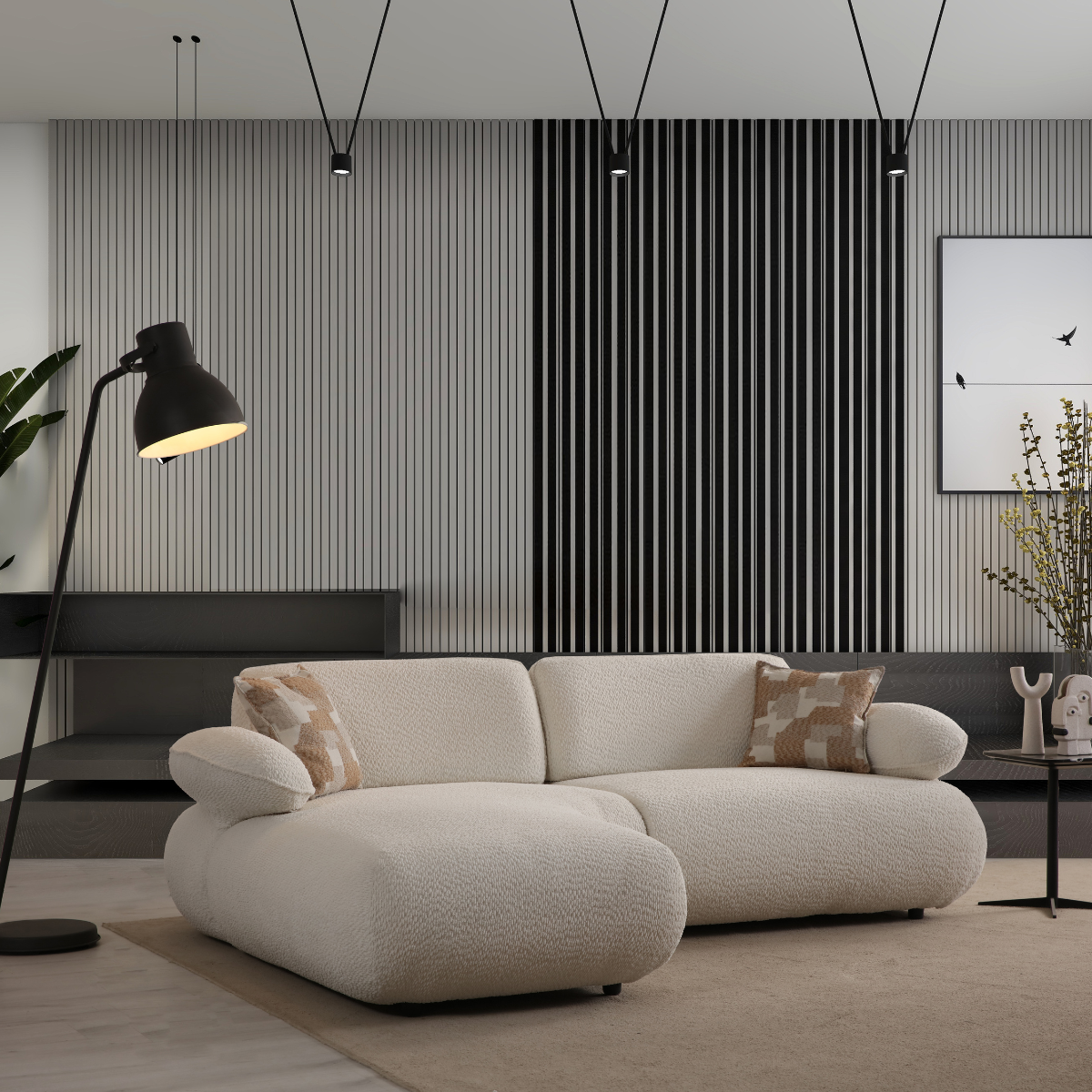 Modern living room with a beige sofa, black floor lamp, and decorative wall art.
