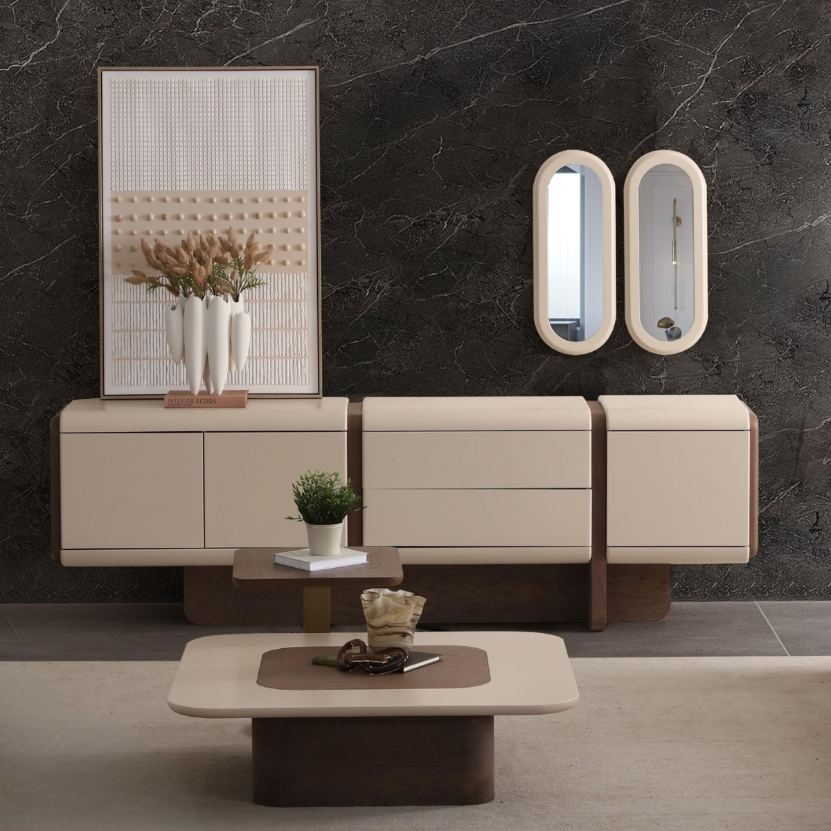 Modern living room with beige furniture, a coffee table, and decorative elements against a dark marble wall.