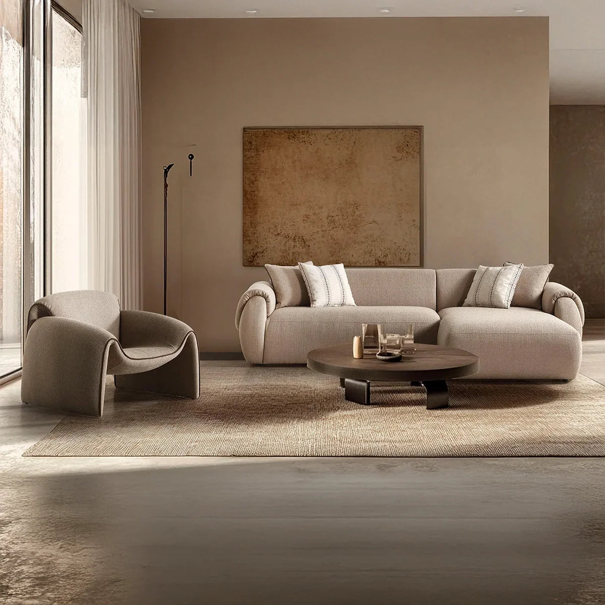 Modern living room with a gray sofa, armchair, and coffee table.