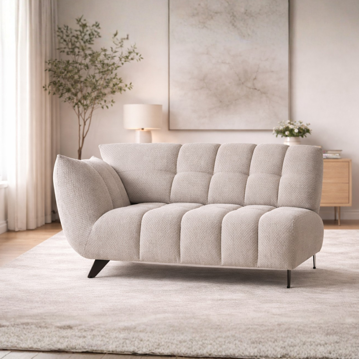 Beige sofa in a living room with decor elements.