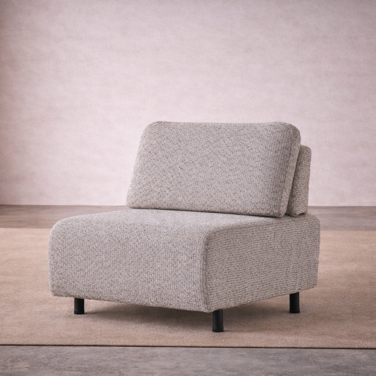 Gray textured armchair on a neutral background