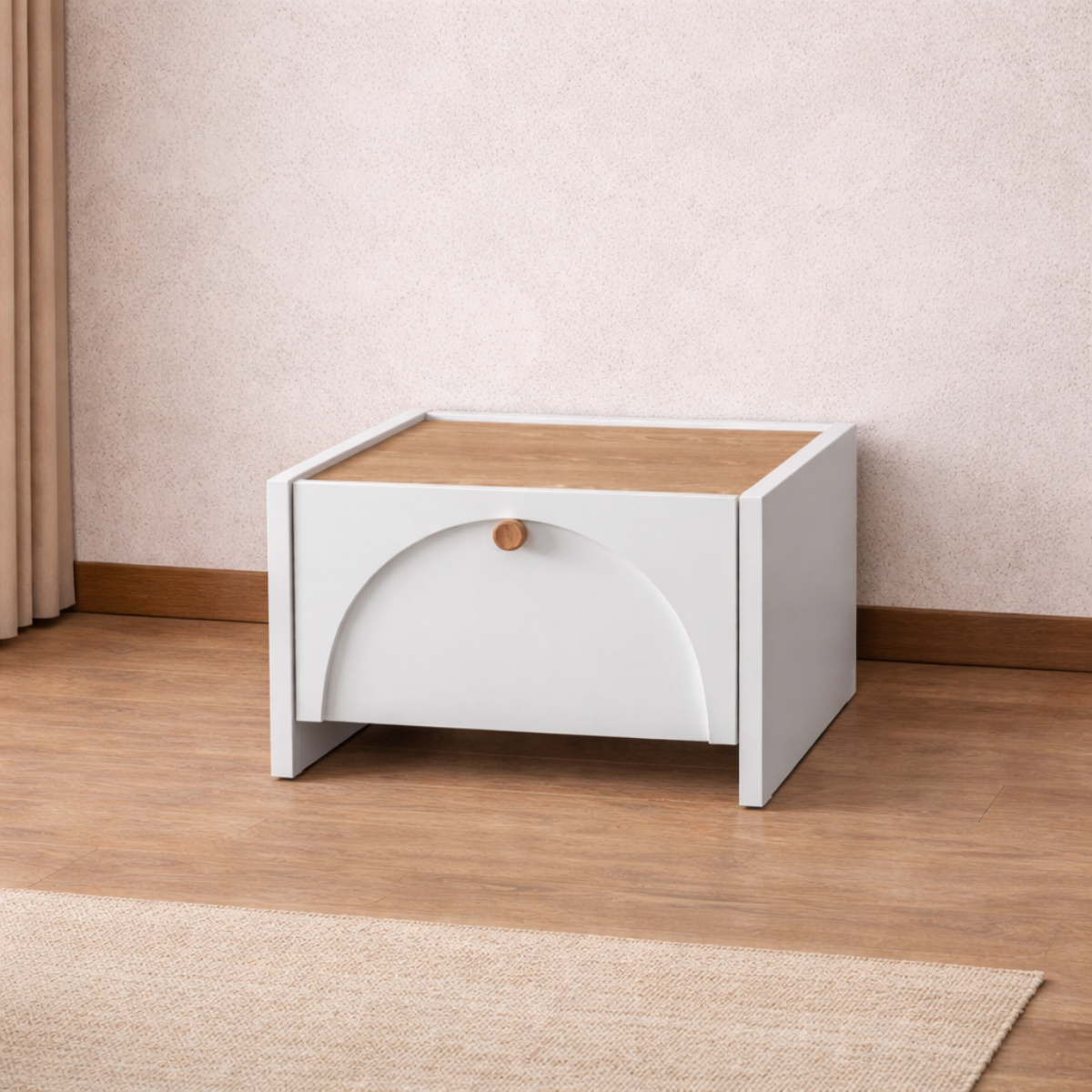 White storage unit with a wooden top on a wooden floor.