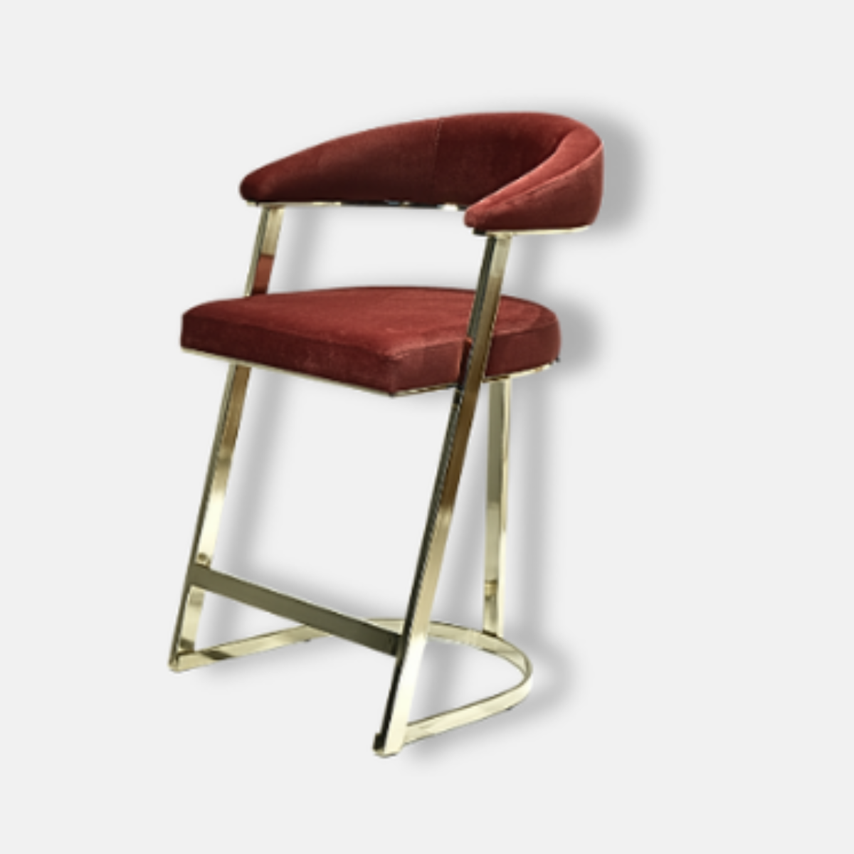 Bar stool with red cushioned seat and gold metal frame on a white background