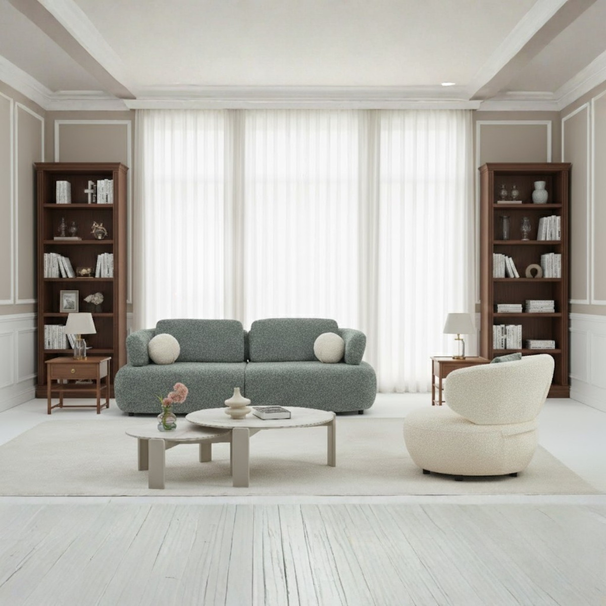 Modern living room with gray sofa, white armchair, and wooden bookshelves.