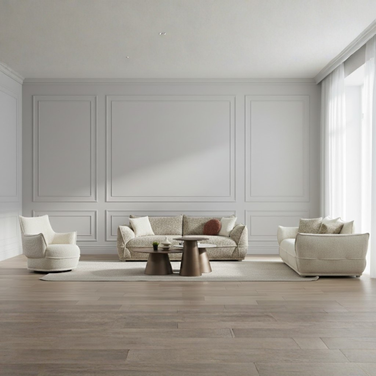 Modern living room with gray sofa, armchairs, and a coffee table.