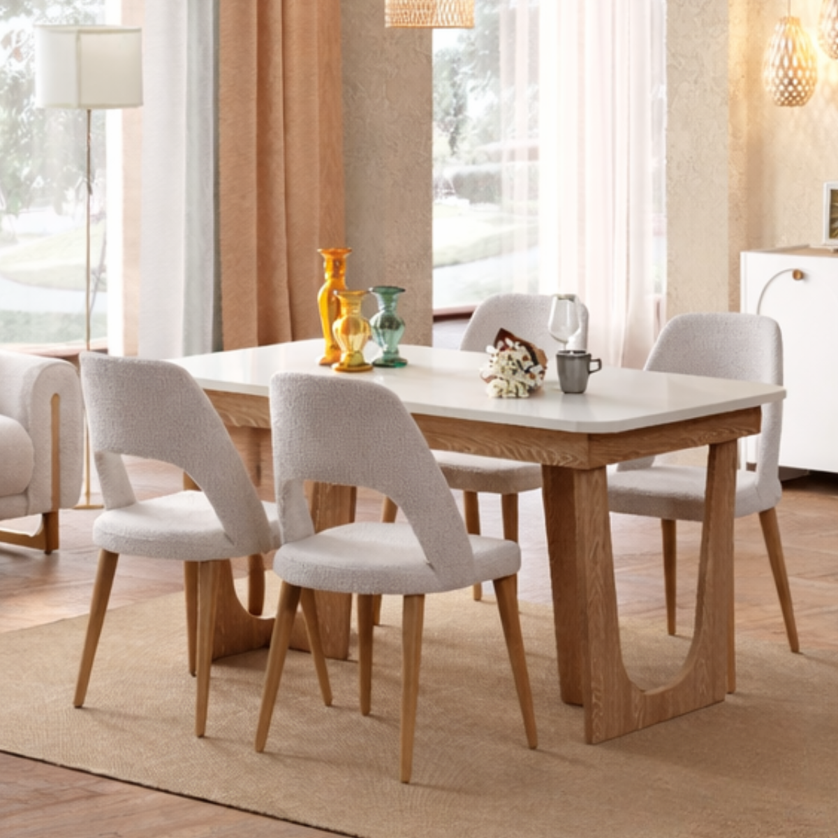 Dining room with a wooden table and gray chairs in a well-lit room.