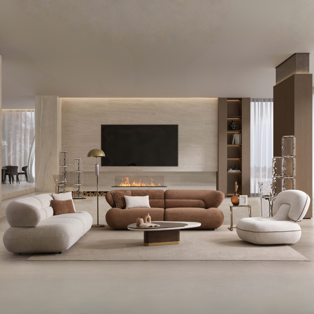 Modern living room with a brown sofa, white armchair, and a fireplace.
